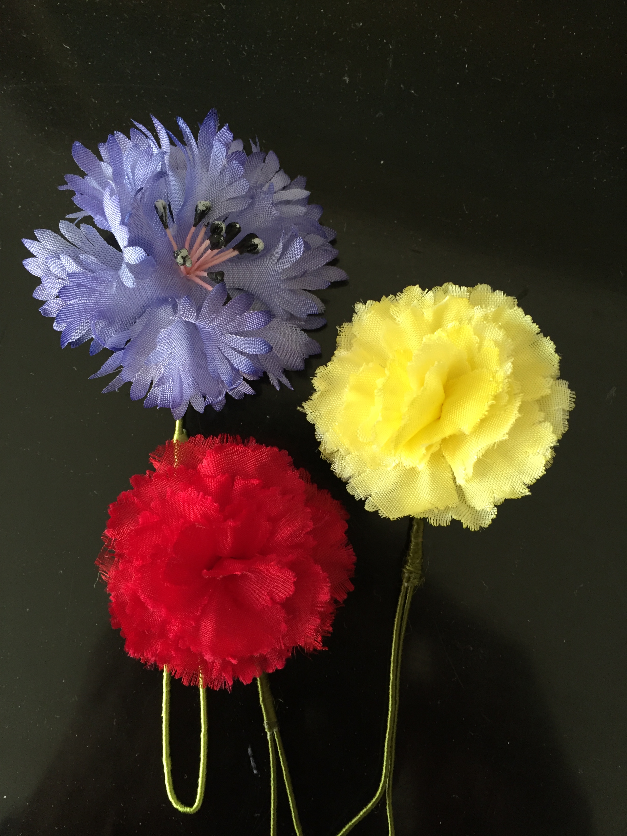 Boutonnieres baksidor 008